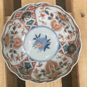 Imari antique dish made in Japan. Catch all dish with a pomegranate design.